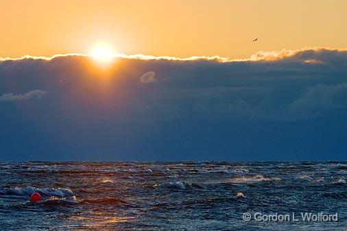 Sinking Into The Clouds_23974.jpg - The sun setting into a bank of clouds, rather than the horizon.Photographed on Canada's south coast at Sherkston Shores, Ontario.